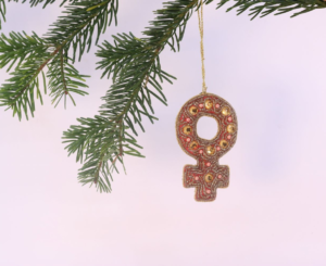Kvindetegn julepynt med perler